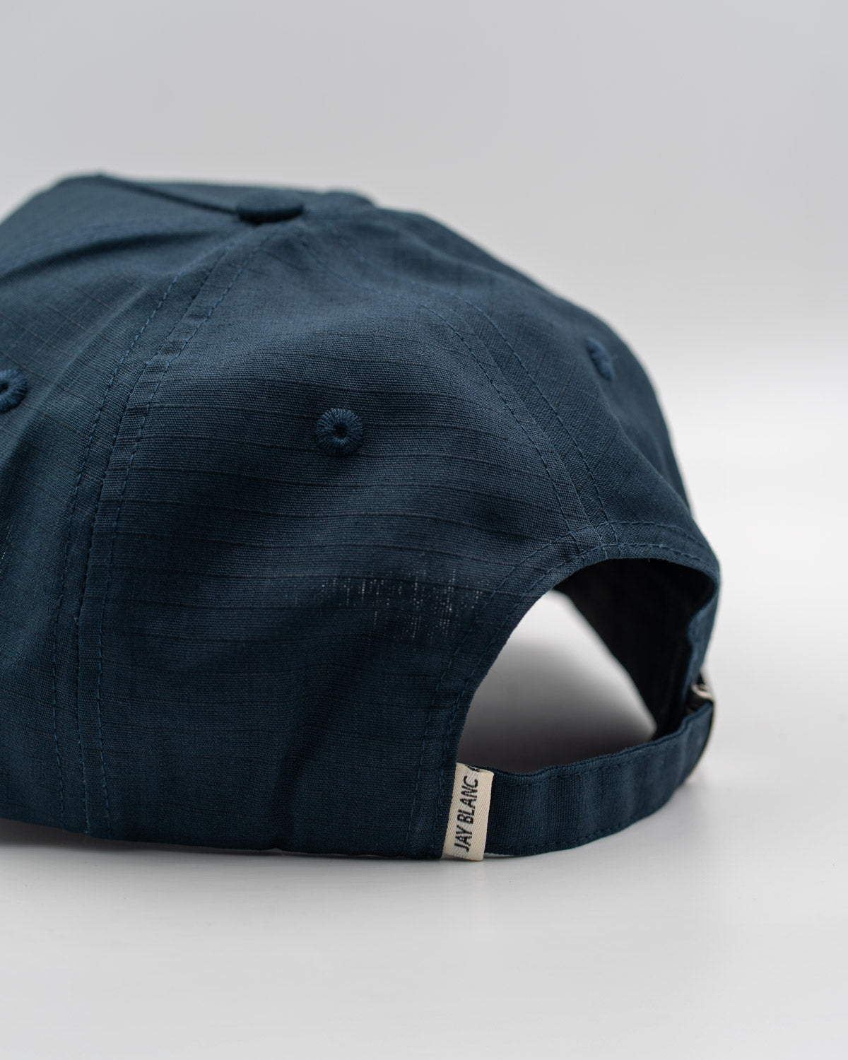 Navy Blue Cap Jay Blanc Structured Brand Hat woven label detail